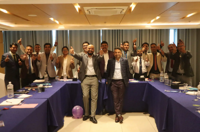 Diwakar Rijal motivational speaker in Nepal leading a corporate session